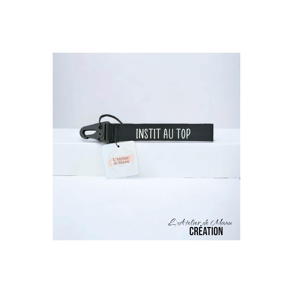 porte clef instit au top noir